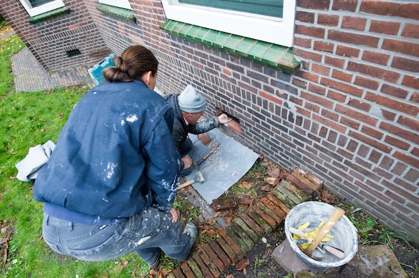 vervangen van de roosters door metselaars 